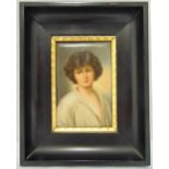 Wagner framed painted porcelain plaque of a lady in a white blouse, signed bottom left, impress mark