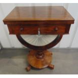 A Victorian mahogany sewing table cum games table on raised circular base with scroll feet, 75 x