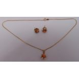 9ct gold coral and pearl pendant on a 9ct gold chain and a pair of matching earrings, approx total