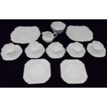 A Shelley blanc de chine tea set to include cups, saucers, plates, a milk jug and a sugar bowl (16)