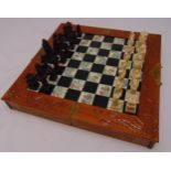A cased chess set in the oriental style