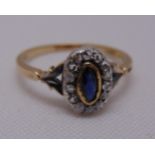 An antique 9ct gold, sapphire and rose cut diamonds dress ring with silver mount, approx total