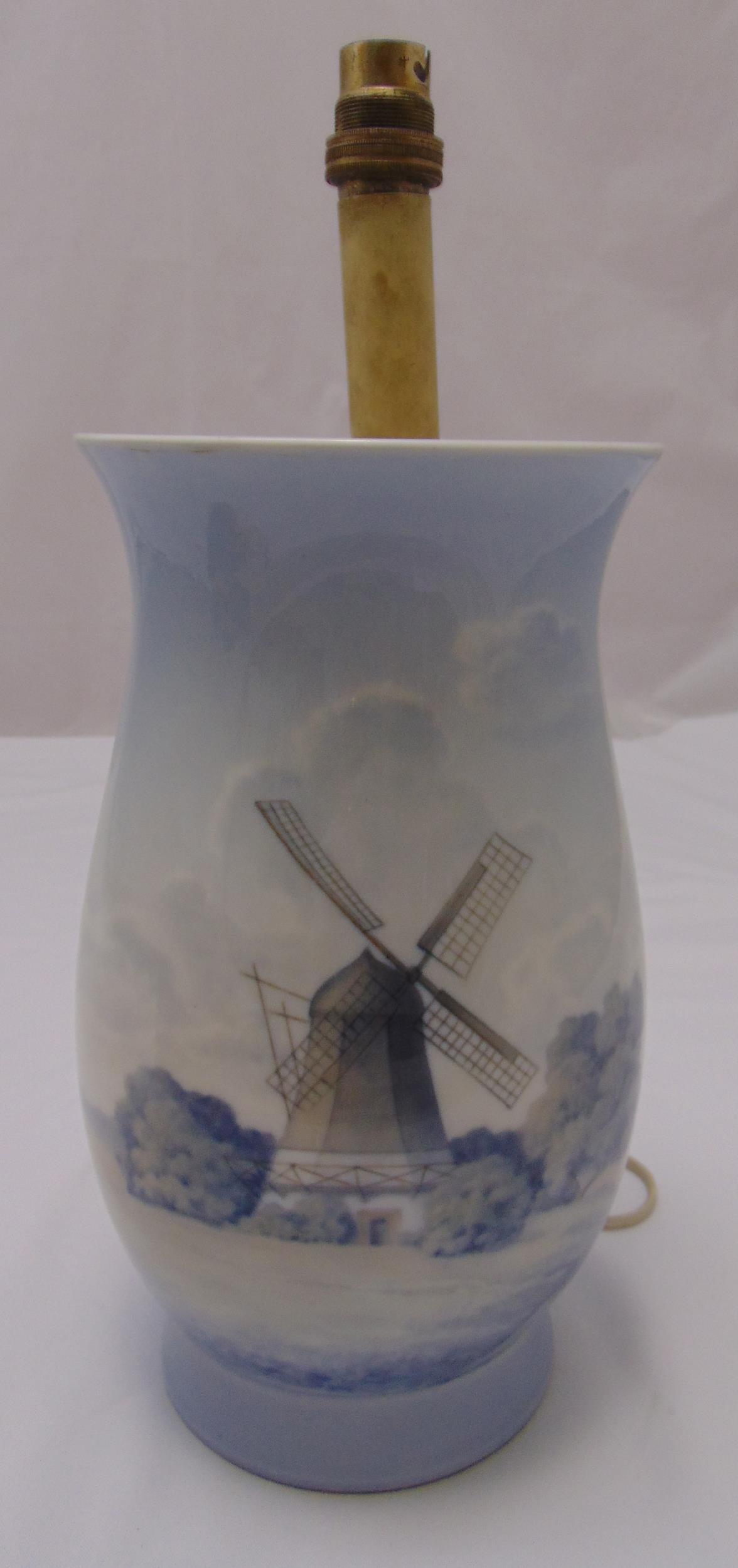 A Royal Copenhagen table lamp of baluster form, the sides decorated with windmills. 30cm (h)