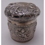 An Indian white metal cylindrical box and cover, 7cm (h)