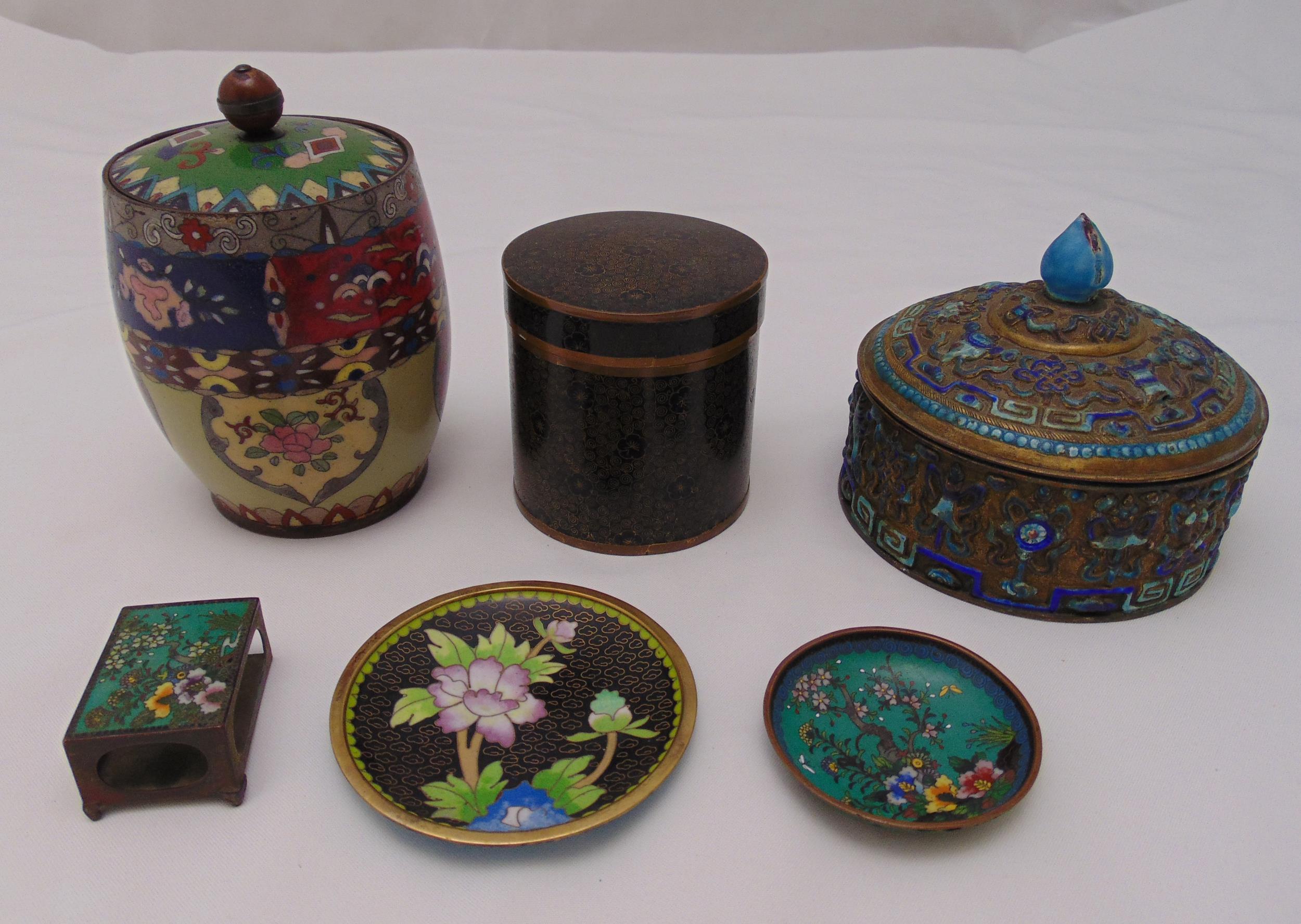 A quantity of Cloisonn‚ to include two dishes, a match striker box, two covered pots and a brass and