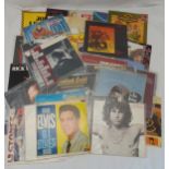 A quantity of vinyl LPs to include Rolling Stones, Queen, Doors, UB40, Dire Straits, Elvis, Stone