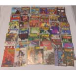 A quantity of comics to include Marvel, DC, Topps and Apple (30)