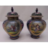 A pair of Vienna style covered vases the side panels depicting crusaders with their loved ones,