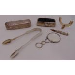 A quantity of hallmarked silver to include a pair of sugar tongs, a magnifying glass, a pencil