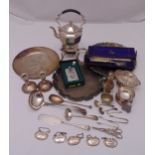 A quantity of silver plate to include trays, a tea kettle on stand and candlesticks