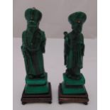 A pair of Chinese malachite and coral figurines of a lady and gentleman on rectangular wooden