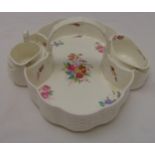 A Coalport strawberry set decorated with floral sprays and with central loop carrying handle