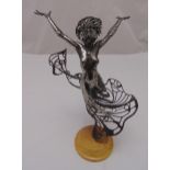 A cast metal figurine of a dancing lady on raised circular base, 43cm (h)