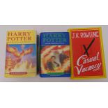 Three J.K. Rowling first edition hardbound books with dust jackets to include Harry Potter and the