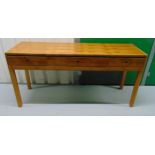 A rectangular three drawer sideboard on four rectangular legs, 74 x 152.5 x 46cm