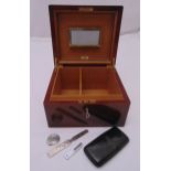 An Astleys rectangular humidor of customary form to include a leather travel cigar holder and