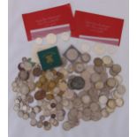 A quantity of coins to include GB pre 1947 silver and foreign coins