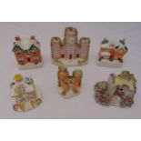 A quantity of collectable Staffordshire pastille burner cottages of various form and shape, (6)