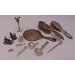 A quantity of hallmarked silver and white metal to include dressing tables brushes, a mirror, a