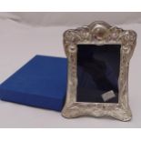 A hallmarked silver photograph frame in original packaging (as new)
