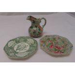 A Spode jug of pear shape with scroll handle and two decorative octagonal Spode plates (3)