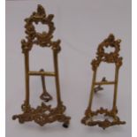 Two gilt metal table picture easels with hinged back struts, tallest 30cm (h)