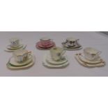 A quantity of Shelley Queen Anne style porcelain trios of various style and decoration, marks to the