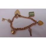 9ct gold charm bracelet with five charms and a padlock clasp, approx total weight 18.5g