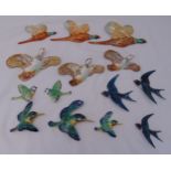 A quantity of ceramic wall mounted birds to include Beswick (14)