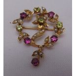 An antique gold, seed pearl, amethyst and peridot brooch, approx total weight 3.9g