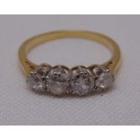 Gold four stone diamond ring, tested 18ct, approx total weight 2.4g