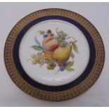A 19th century Meissen cabinet plate decorated with fruits within a cobalt blue gilded border, marks