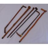 Six walking sticks and riding crops of various form and styles