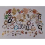 A quantity of silver and costume jewellery to include necklaces, rings, earrings, bracelets and