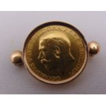 1912 gold sovereign mounted in a brooch frame