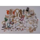 A quantity of silver and costume jewellery to include necklaces, rings, earrings, bracelets and