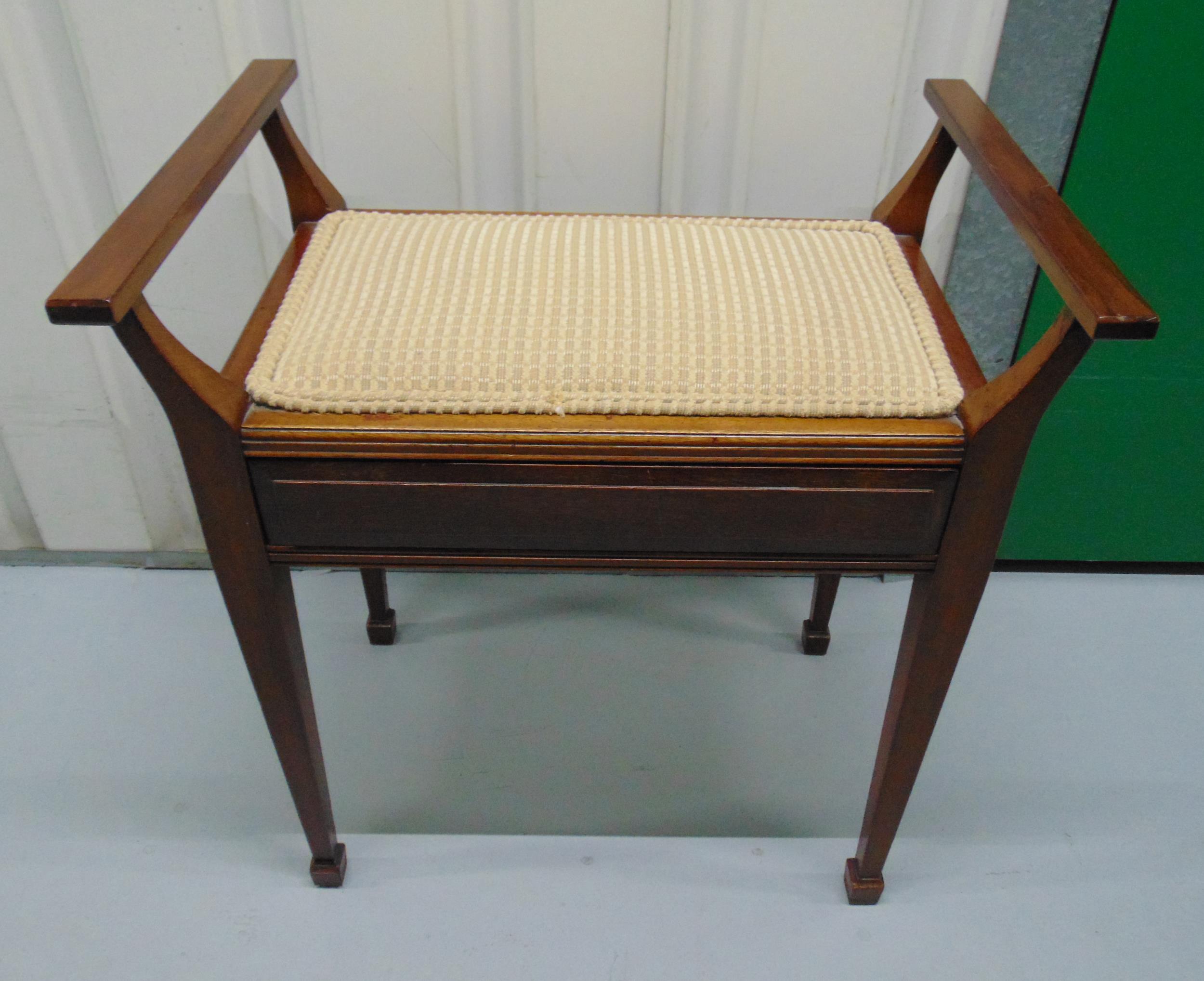 A mahogany piano stool with single drawer on four tapering rectangular legs, 64 x 60 x 41.5cm