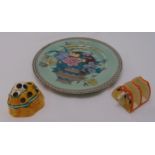 A Clarice Cliff Bizarre toast rack, a Clarice Cliff flower frog and a Clarice Cliff Ophella plate