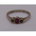 Platinum, ruby and emerald three stone ring, approx total weight 2.1g