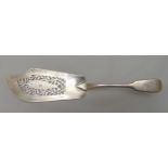 A William IV hallmarked silver fish slice, the pierced blade engraved with a fish, London 1836,