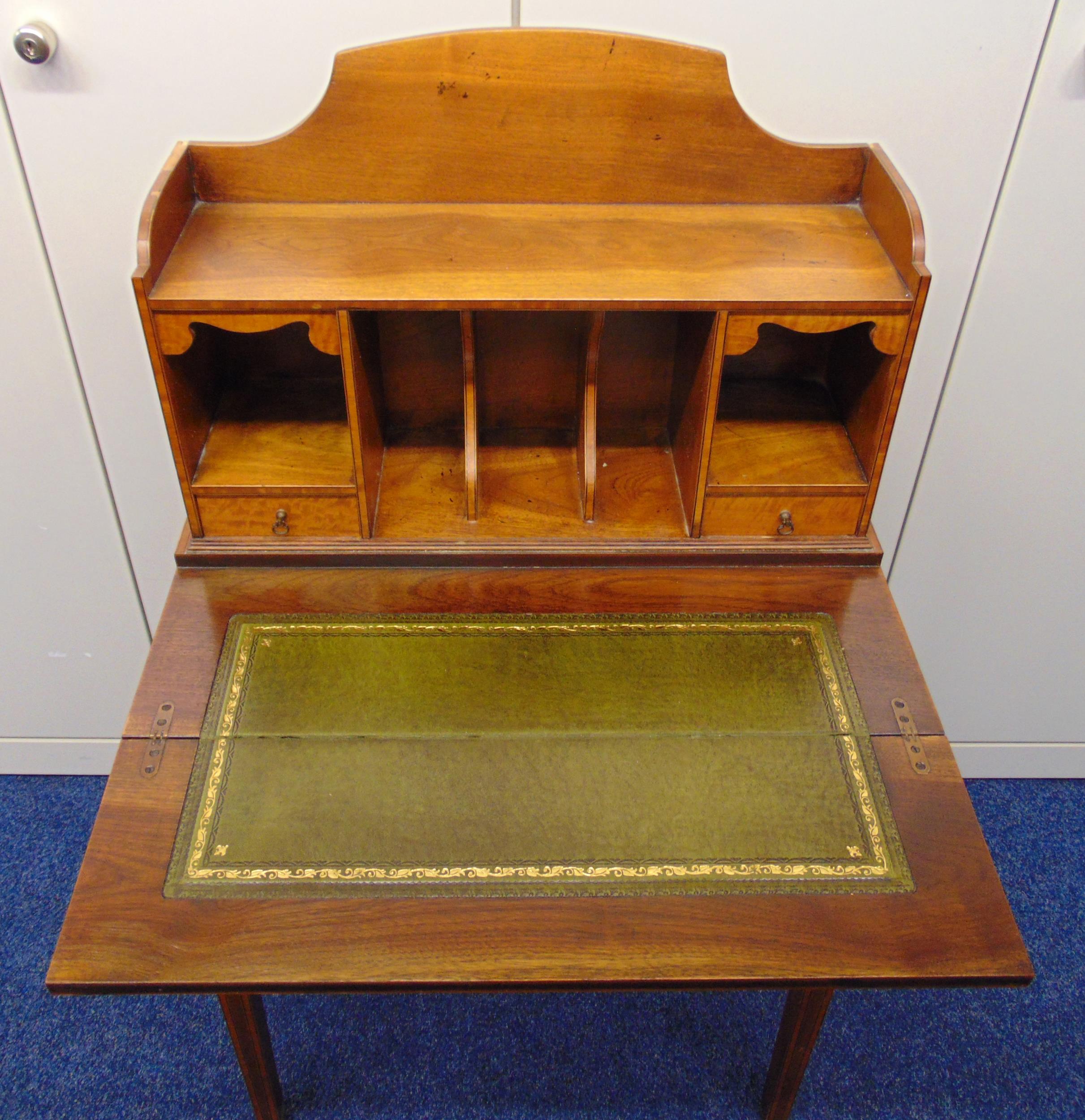 An Edwardian rectangular mahogany desk with fitted compartments, three drawers, hinged top with - Image 2 of 2