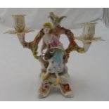 Dresden figural two light candelabrum on three scroll supports, A/F, 23cm (h)