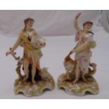 A pair of continental female figurines in classical dress on raised oval naturalistic base, marks to