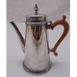 A Georgian style hallmarked silver coffee pot, tapering cylindrical with angled spout and