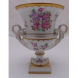 A Dresden campagna form vase decorated with flowers, leaves and scrolls, marks to the base, 26cm (