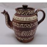 A Slipware teapot dated 1894 and dedicated to Georgina Jeffrey, 19cm (h)