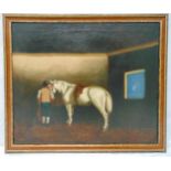 A framed oil on canvas of a horse and groom in a stable, 51 x 60.5cm