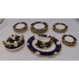 Royal Crown Derby Vine Cobalt dinner service to include plates, bowls, sauce boat and stand, a