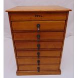 A table top rectangular pine filing cabinet, the six drawers with brass pendant handles, 61 x 43 x