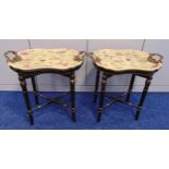 A pair of continental shaped oval ceramic tea tray tables decorated with flowers, leaves and pierced